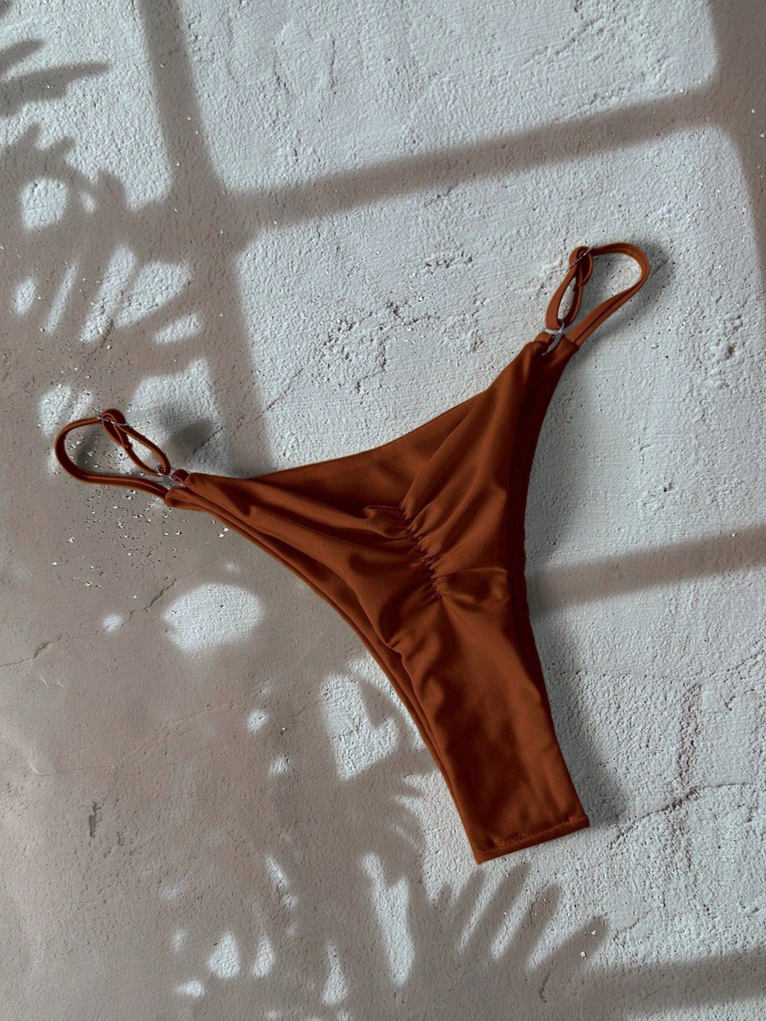 Women’s bikini bottom with fashionable high cut and adjustable straps Mune Fashion