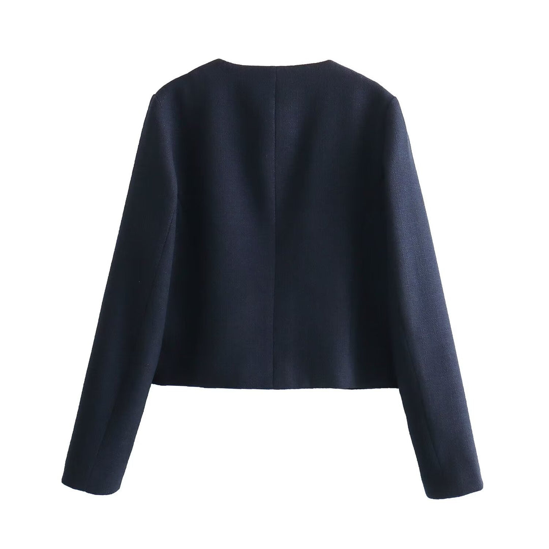 Women's short-cut Bouclé tweed jacket with round neckline decorative button details and attached flap pockets Mune Fashion