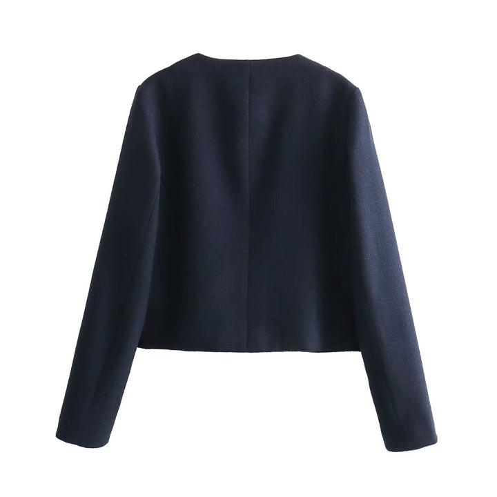 Women's short-cut Bouclé tweed jacket with round neckline decorative button details and attached flap pockets Mune Fashion