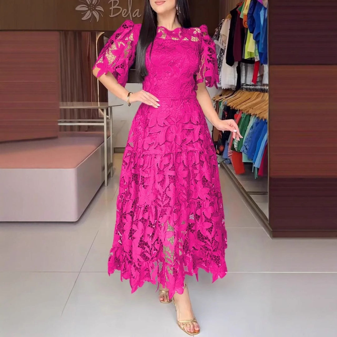 Women's maxi dress made of floral guipure lace with a fitted silhouette and tiered hem Mune Fashion
