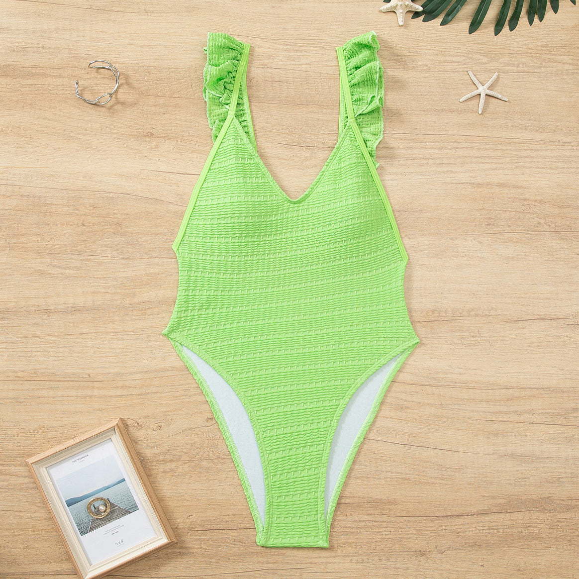 Ladies' one-piece swimsuit with ruffle details and high leg cut Mune Fashion