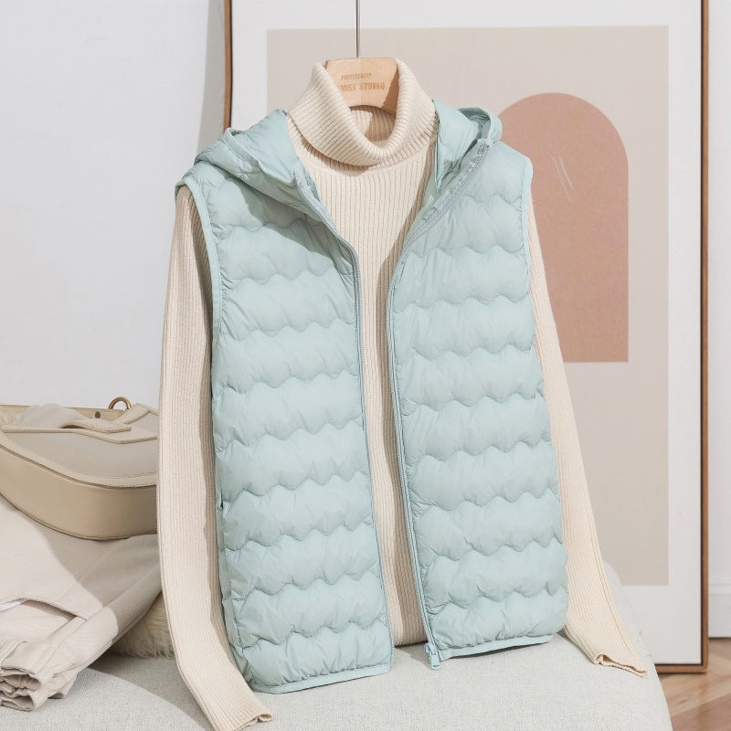 Women Ultra-light Hooded Quilted Vest with Ergonomic Wave Quilting and Compact Packing Format Mune Fashion