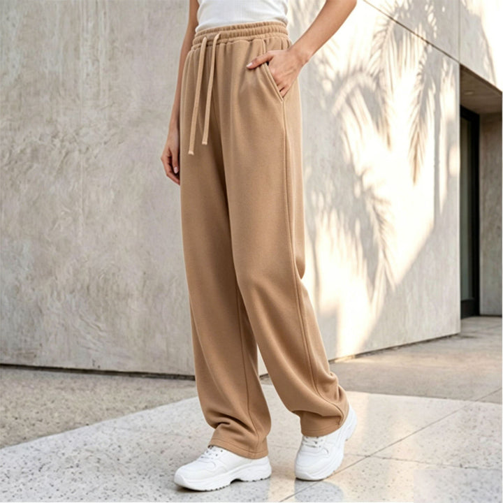 Women's wide lounge palazzo pants with high comfort waistband, drawstring, side pockets, and decorative side seam Mune Fashion