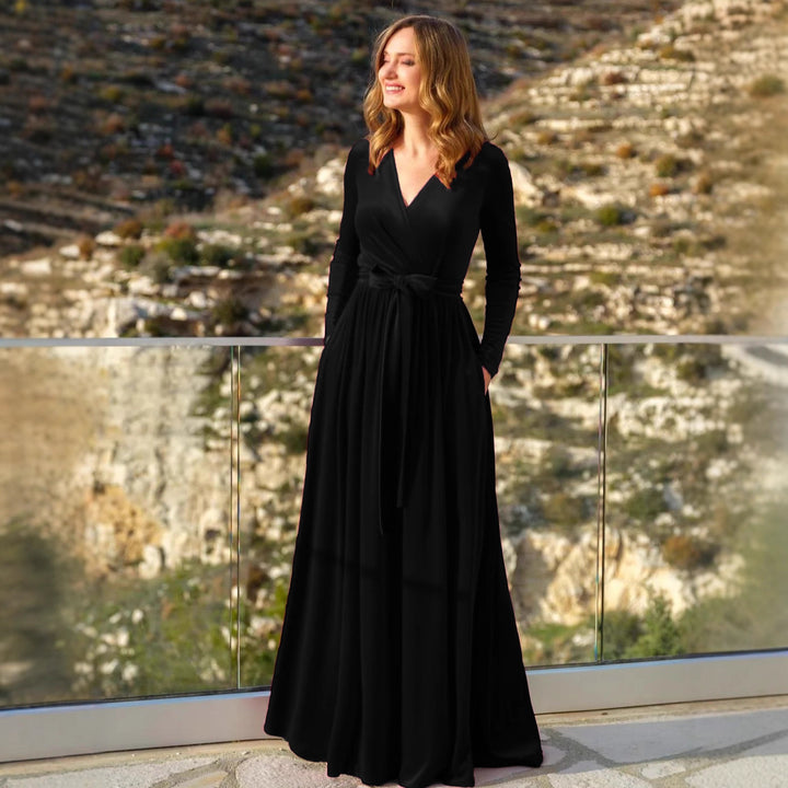 Women's elegant wrap maxi dress made of velvet with V-neck, waist belt, and side pockets Mune Fashion