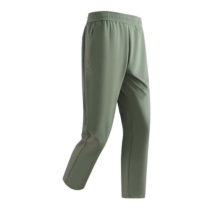Men's Tapered Performance Jogging Pants made of stretch functional material with elastic waistband & zippered pockets Mune Fashion