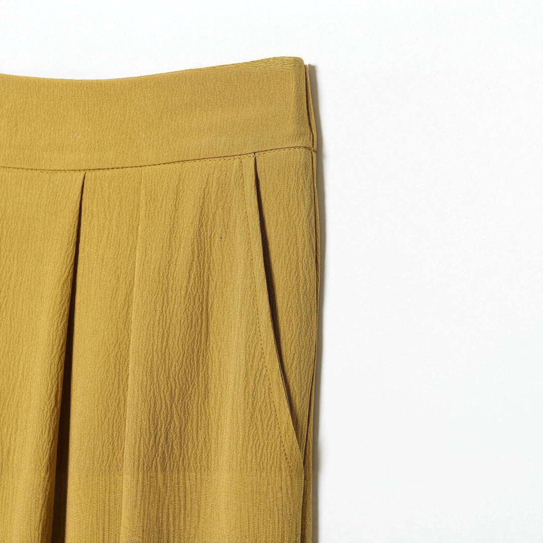 Women’s harem pants with high waistband, pleated folds and knotted cuffs Mune Fashion