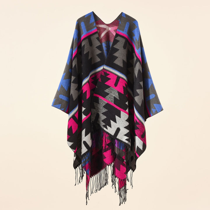 Women Oversize Ruana with V-neck, coarse jacquard pattern and long fringes Mune Fashion