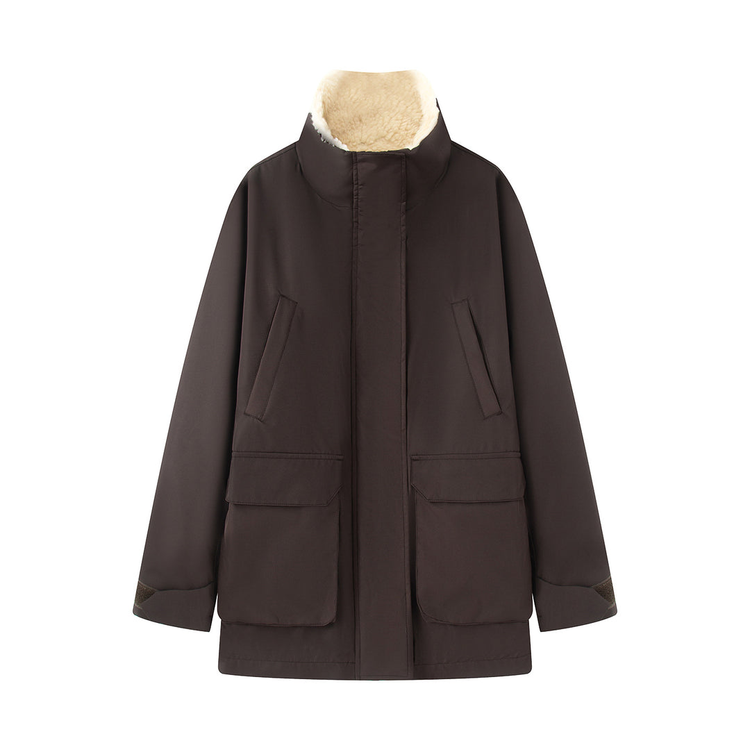 Women's oversized parka with high teddy-lined stand collar, concealed front placket and large flap pockets Mune Fashion