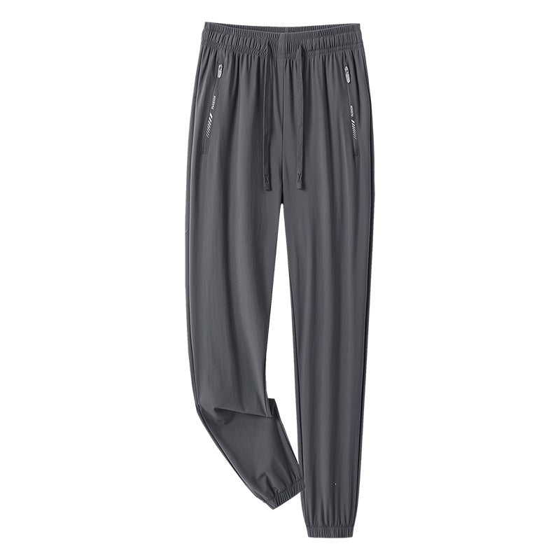 Men's sporty jogging pants with adjustable waistband and zippered pockets Mune Fashion