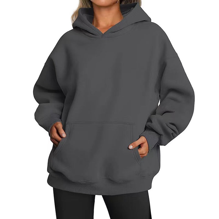 Women's oversized hooded sweatshirt with raglan sleeves, kangaroo pocket and soft fleece lining Mune Fashion