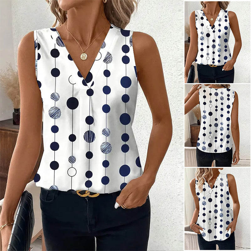 Women's V-neck blouse top with vertical polka dot pattern and subtle center seam Mune Fashion
