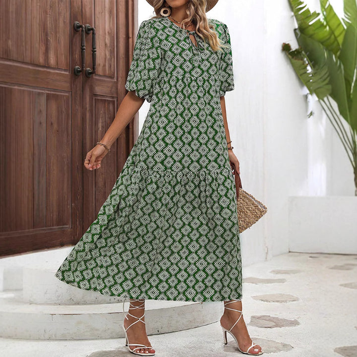 Women’s airy maxi dress with geometric ethnic print, gathered tiered skirt and keyhole neckline Mune Fashion