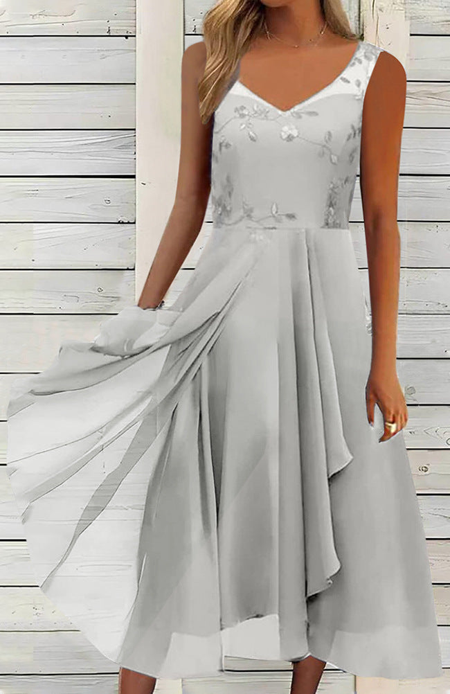 Women A-line chiffon dress with floral embroidered bodice, V-neck, draped godet swing and concealed side pockets Mune Fashion