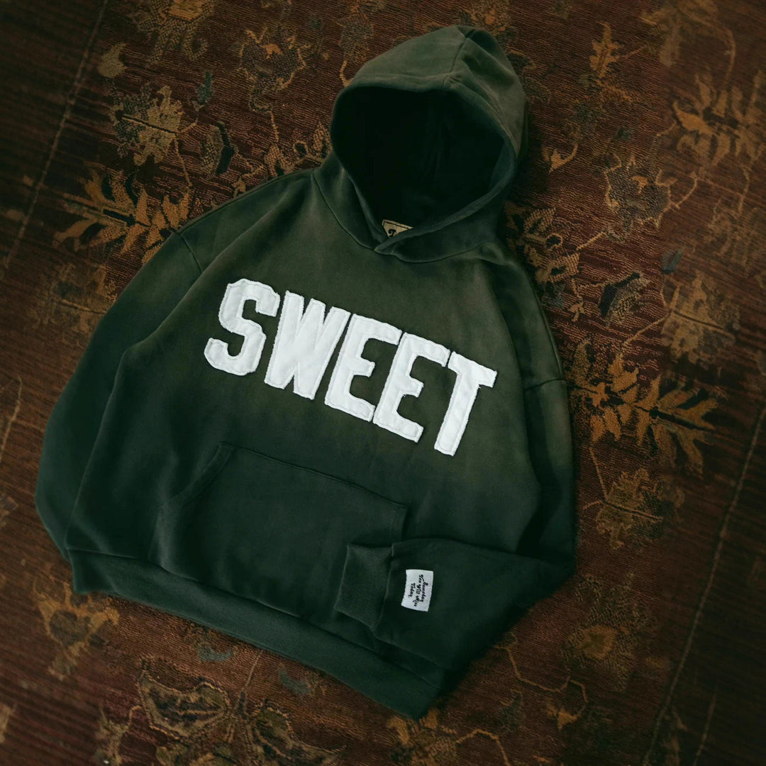 Unisex nan oversized hoodie with appliquéd letter patches and kangaroo pocket Mune Fashion