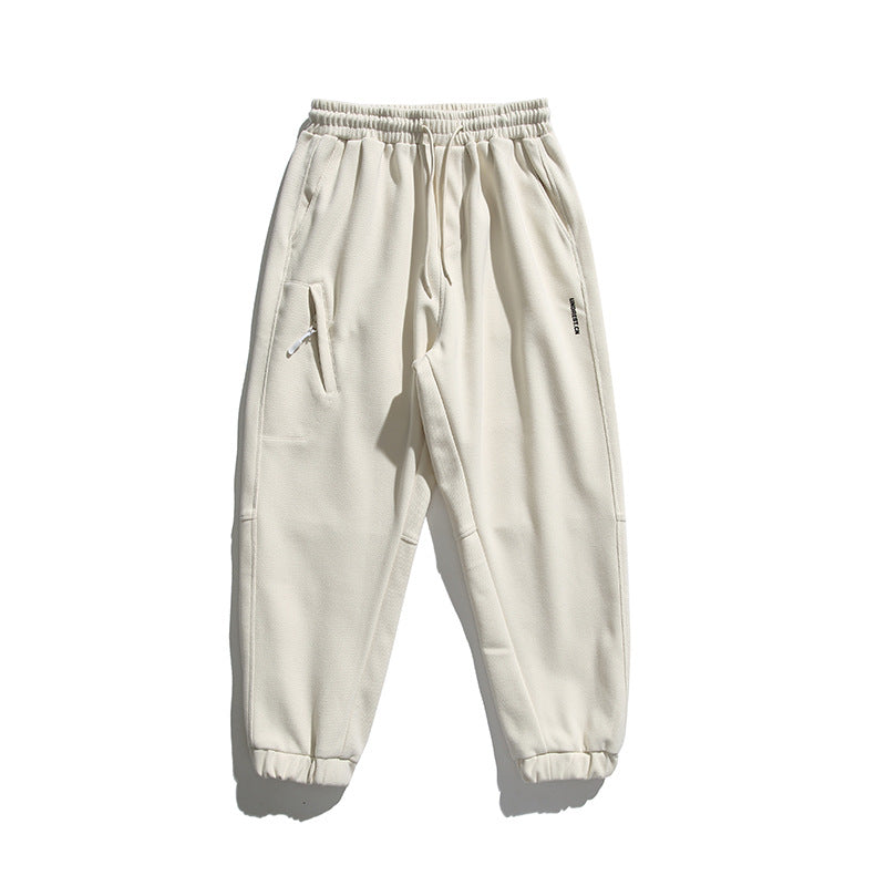 Unisex wide jogging pants in oversized cut with elastic waistband, knee panel and ribbed cuffs Mune Fashion