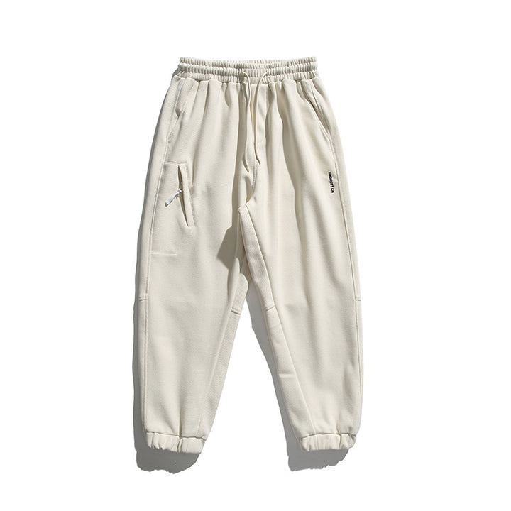 Unisex wide jogging pants in oversized cut with elastic waistband, knee panel and ribbed cuffs Mune Fashion