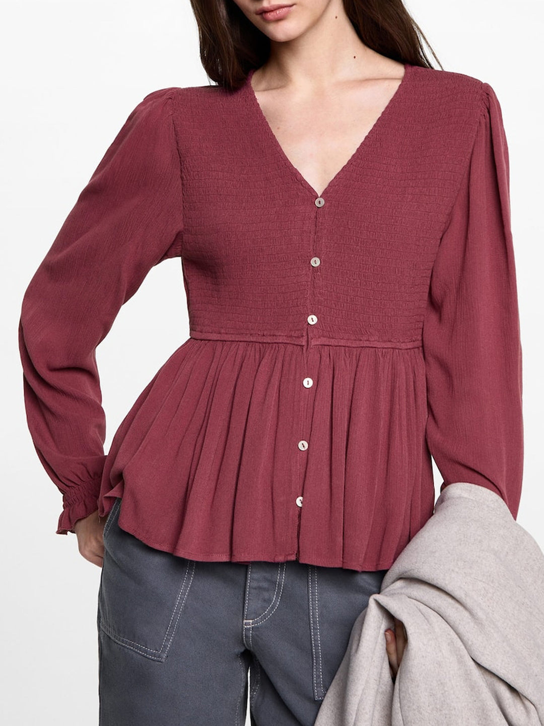 Women's peplum blouse made of textured viscose fabric with V-neckline and button placket Mune Fashion