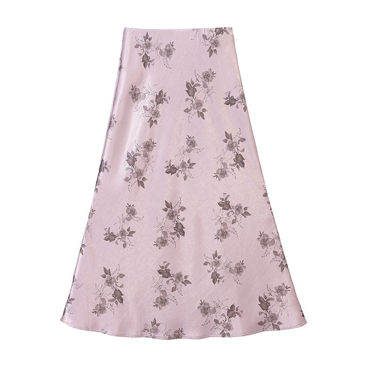 Women's high-waisted A-line midi skirt in jacquard-like satin with floral relief print.
