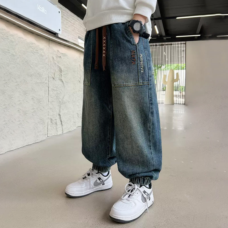Unisex wide denim pants with elastic cuffs and large pockets Mune Fashion