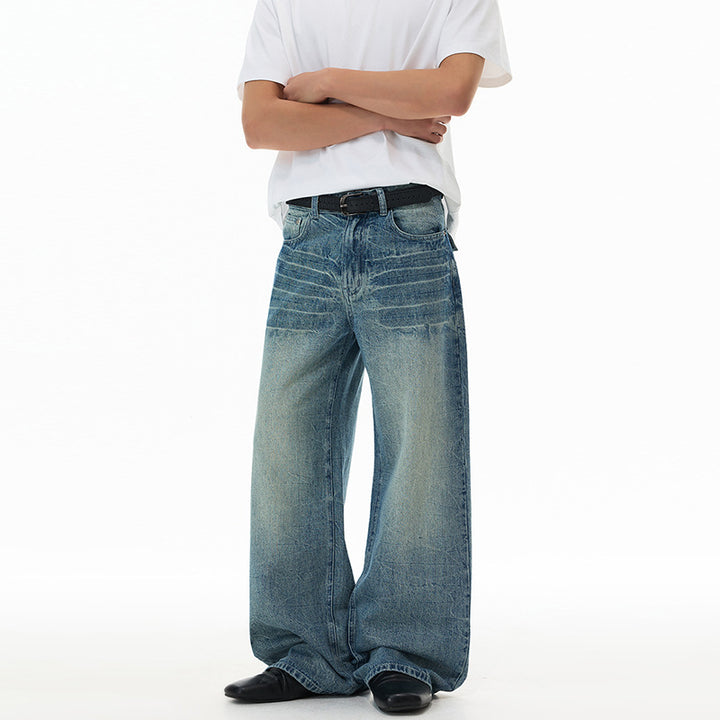 Men's ultra-wide cut denim baggy jeans with striking whisker accents and floor-length hem Mune Fashion