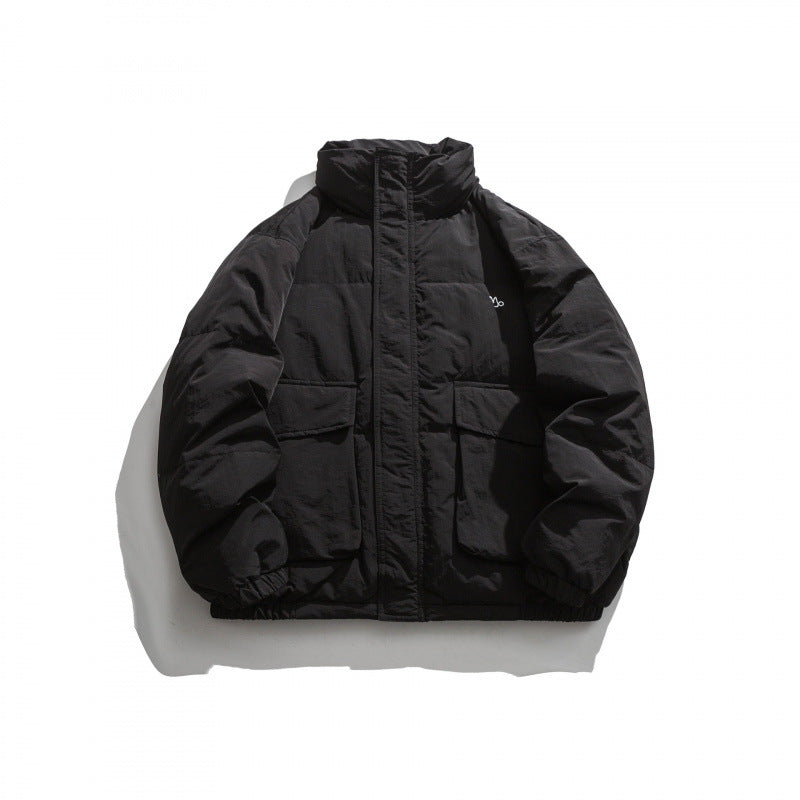 Unisex Oversized padded quilted jacket with high stand collar, large flap pockets and crinkle effect Mune Fashion