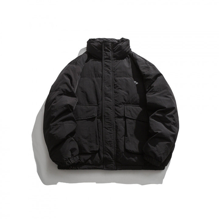 Unisex Oversized padded quilted jacket with high stand collar, large flap pockets and crinkle effect Mune Fashion