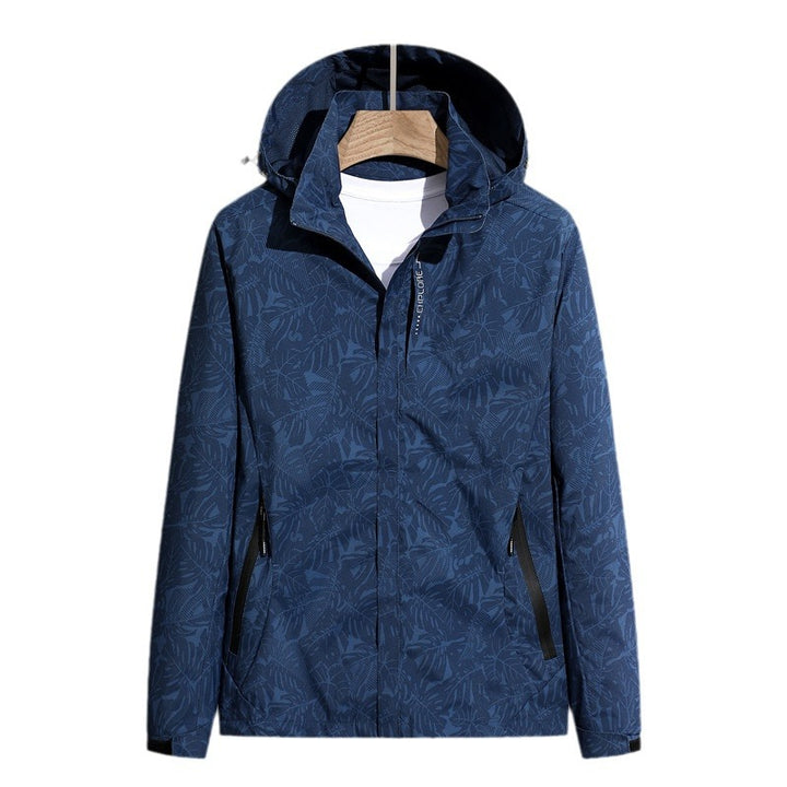 Women's lightweight packable rain and wind jacket with hood, leaf pattern and concealed zippers Mune Fashion