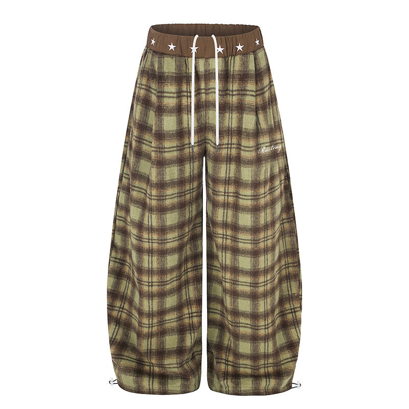 Women's Extra Wide Checked Palazzo Lounge Pants made of soft fleece with star-embellished comfort waistband, drawstring and adjustable hem.