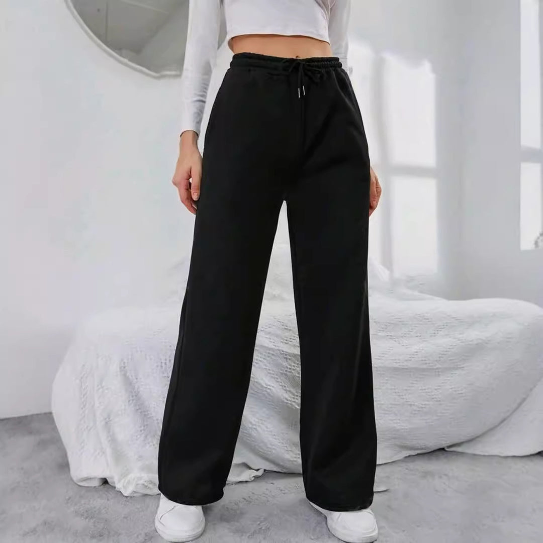 Women's High-Waist Wide-Leg Jogging Pants with elastic comfort waistband, drawstring, and deep side pockets Mune Fashion