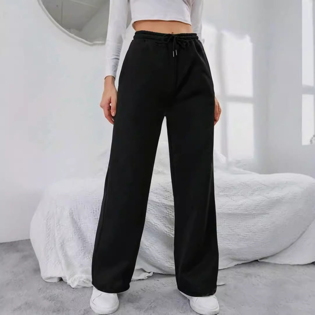 Women's High-Waist Wide-Leg Jogging Pants with elastic comfort waistband, drawstring, and deep side pockets Mune Fashion