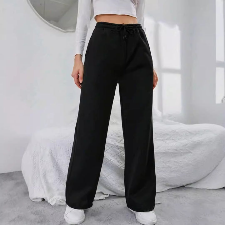 Women's High-Waist Wide-Leg Jogging Pants with elastic comfort waistband, drawstring, and deep side pockets Mune Fashion