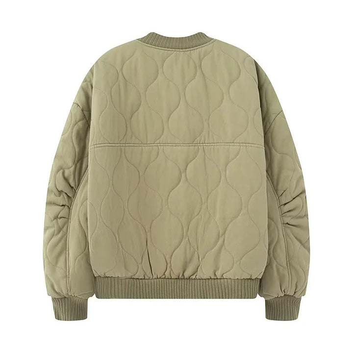 Ladies nan quilted bomber jacket with round neck, padded quilting and flap pockets Mune Fashion