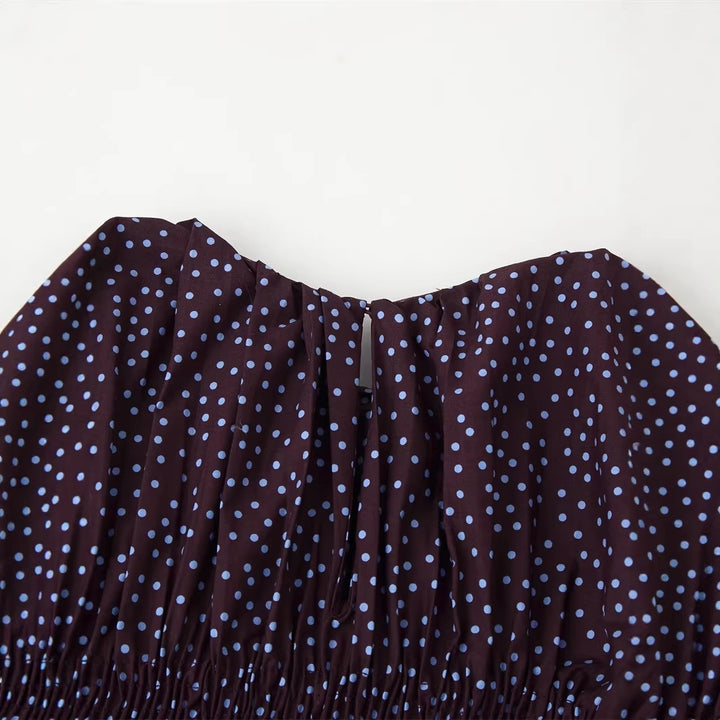 Women gathered polka dot top with elastic smocked body, balloon sleeves and ruffle hem Mune Fashion