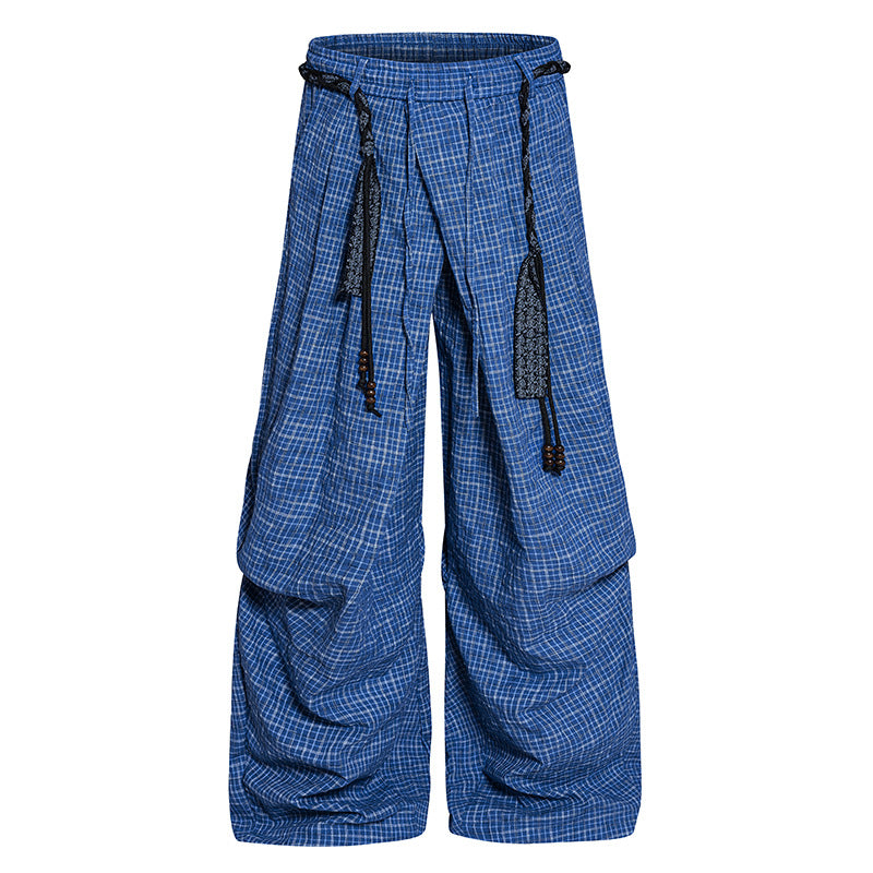 Women's wide palazzo pants with layered pleats, high waistband, and decorative cord belt Mune Fashion