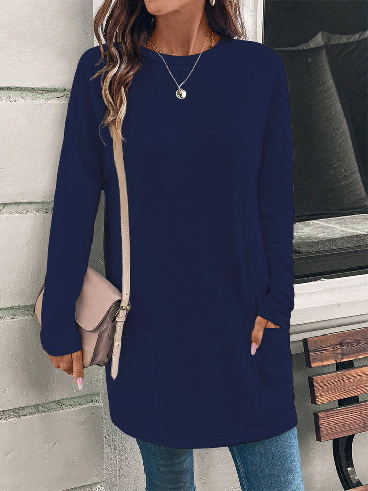 Women's loosely cut long tunic with round neckline, side pockets, and soft jersey Mune Fashion