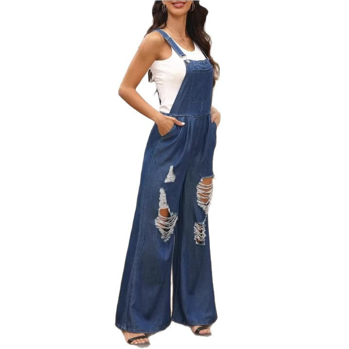 Women's loose distressed overalls with adjustable straps and large knee rips Mune Fashion
