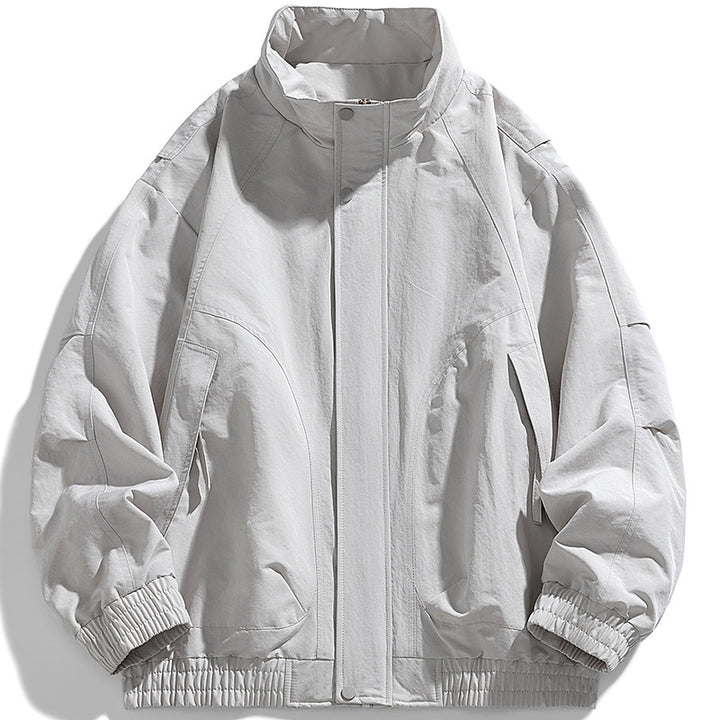 Men's modern utility blouson with standing collar, concealed snap button placket, and elastic hem Mune Fashion