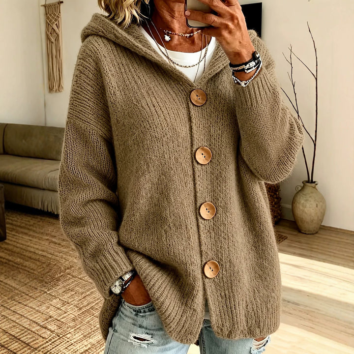 Women's chunky knit hooded cardigan with oversized silhouette, wooden button placket and ribbed cuffs Mune Fashion