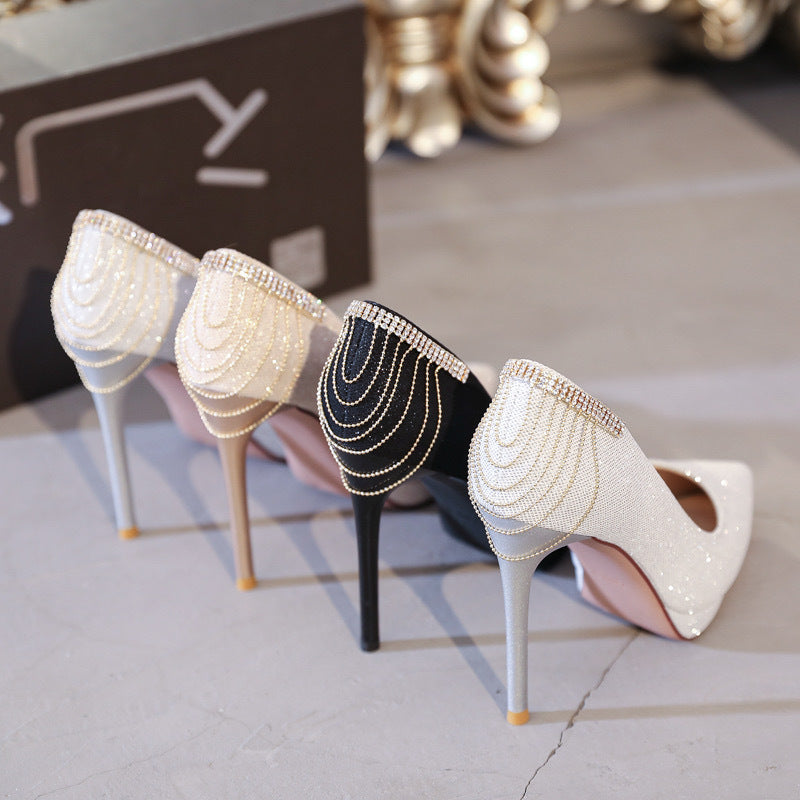 Women's elegant evening pumps with fine glitter mesh, pointed toe, delicate stiletto heel, and decorative heel application Mune Fashion