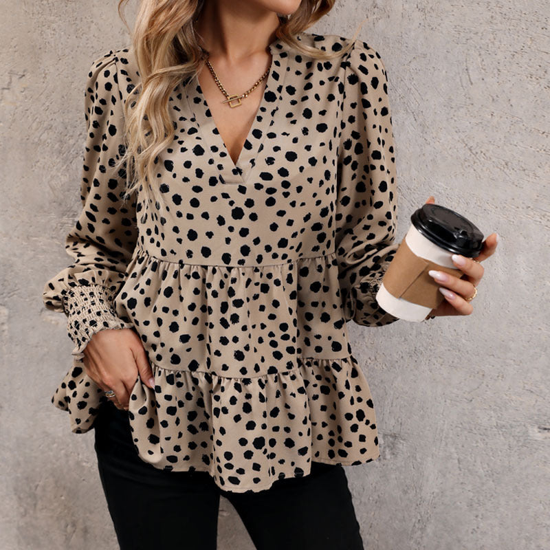 Ladies V neck tunic with tiered hem, smocked cuffs and polka dot all-over print Mune Fashion