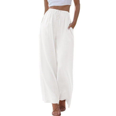 Women's wide linen pants with elastic waistband, drawstring, and side pockets Mune Fashion