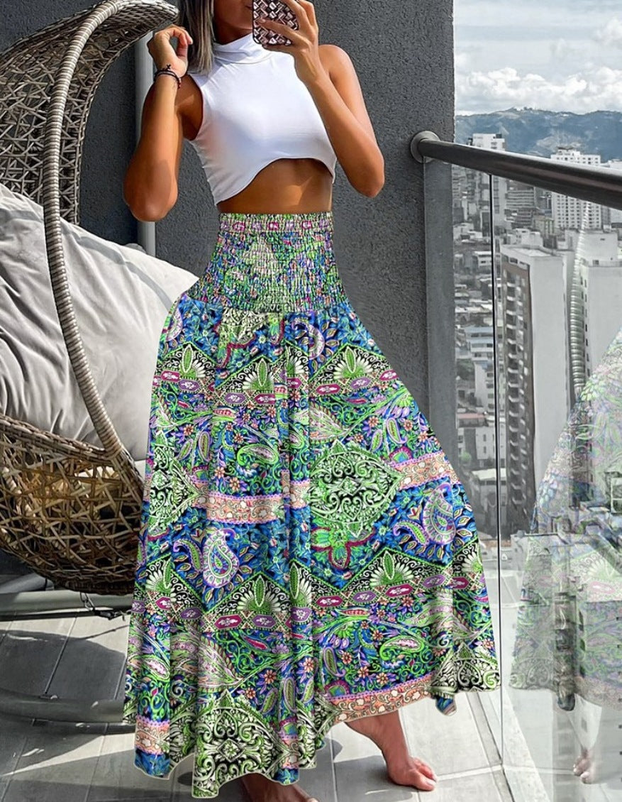 Women's maxi skirt with high smocked waistband, wide fall, and paisley print Mune Fashion