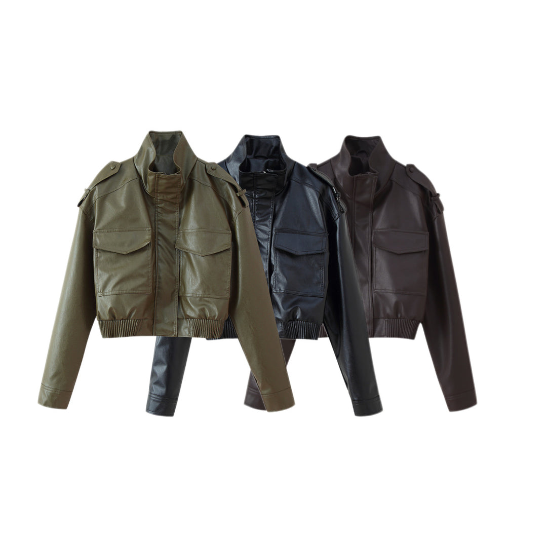 Women Short-Cut Leather Bomber with High Stand Collar, Shoulder Straps and Flap Pockets Mune Fashion