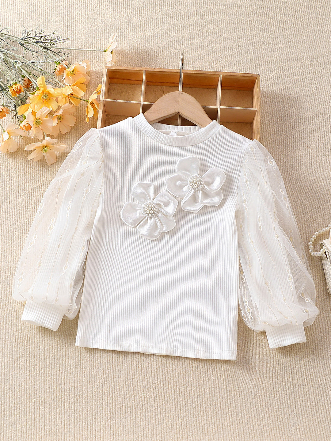 Girls fashionable blouse with transparent puff sleeves and floral accents Mune Fashion