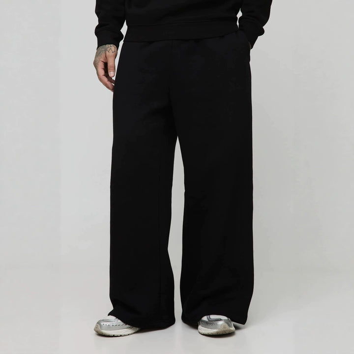 Unisex non-padded sweatpants with elastic comfort waistband, straight leg and side pockets Mune Fashion