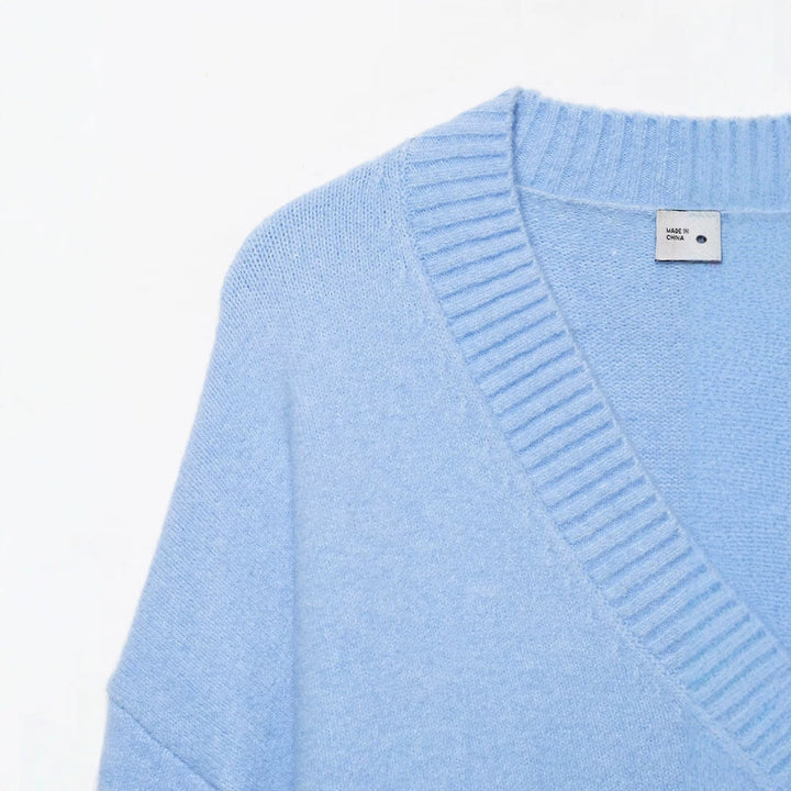 Women's Oversize V-Neck Knit Sweater with Deep Drop and Wide Ribbed Hem Drune