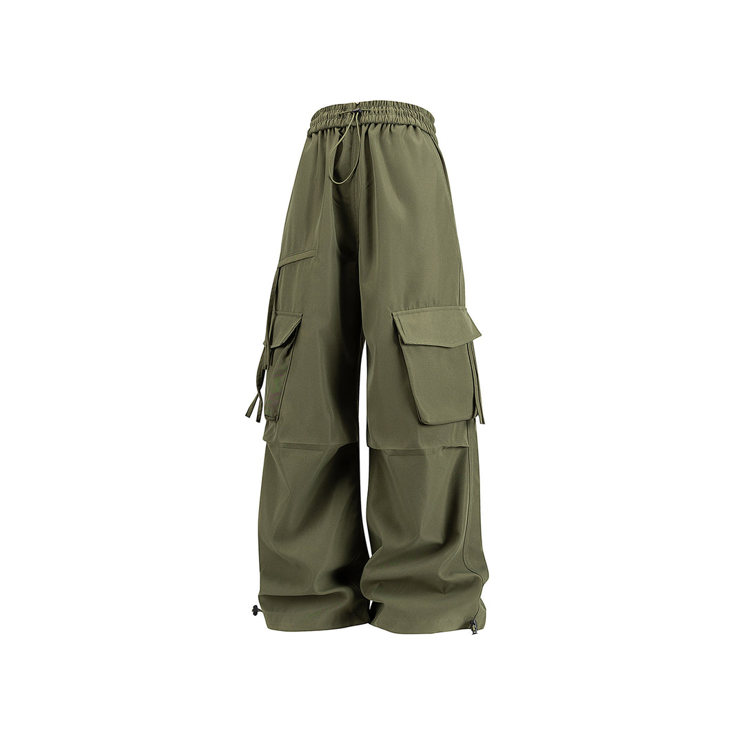 Damen Weite Cargo‑Hose im Baggy‑Cut mit elastischem Tunnelzugbund, Klapp‑Utility‑Taschen und verstellbarem Beinabschluss Mune Fashion