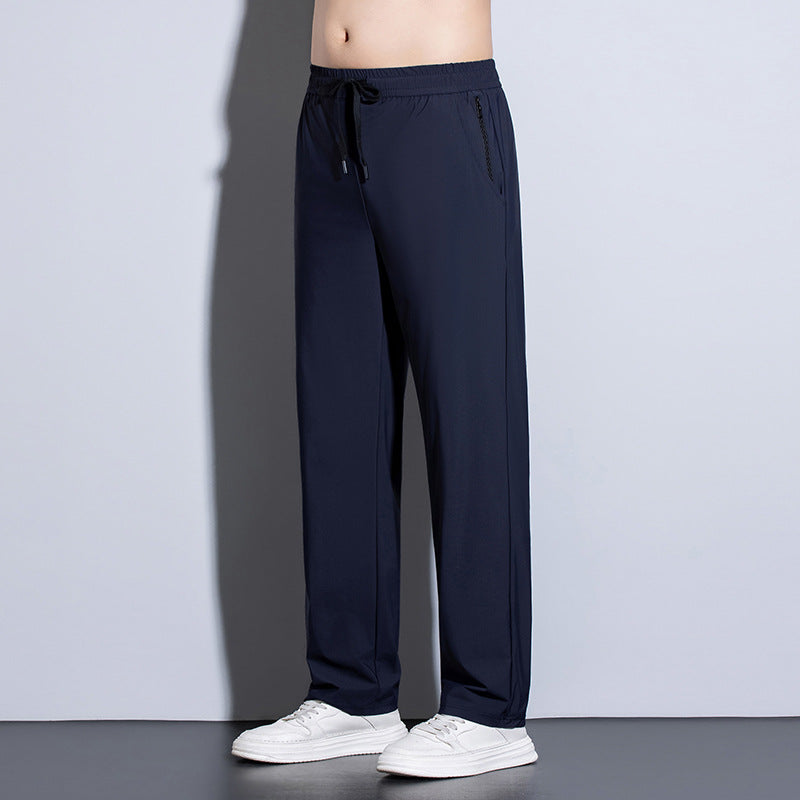 Men's sporty training pants with elastic waistband and practical pockets Mune Fashion