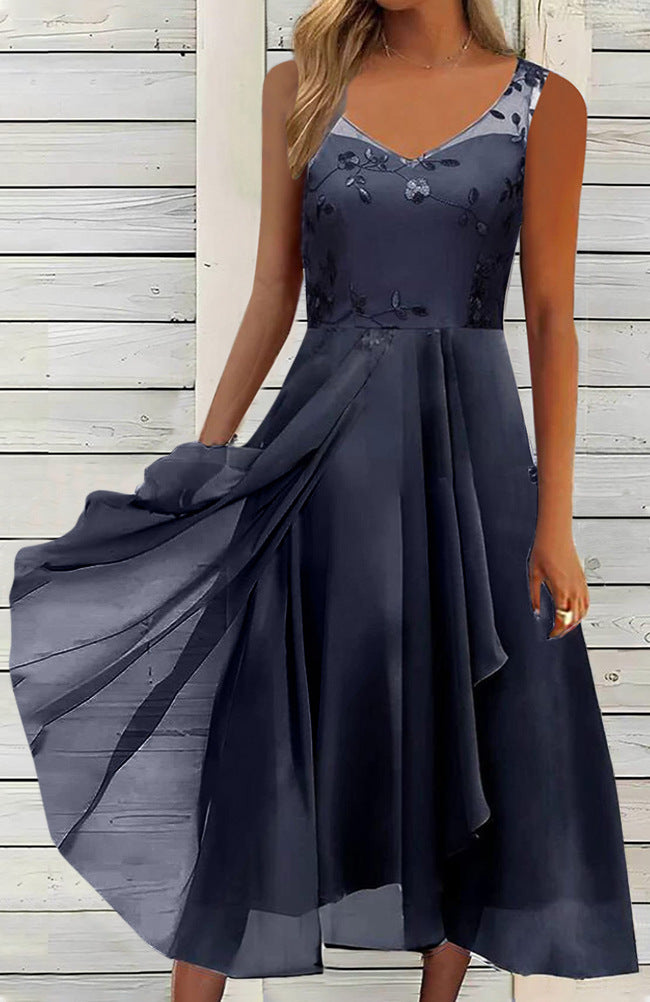 Women A-line chiffon dress with floral embroidered bodice, V-neck, draped godet swing and concealed side pockets Mune Fashion