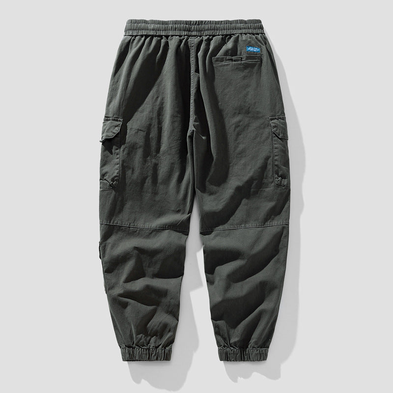 Herren Leichte Canvas-Cargohose im Joggerstil mit elastischem Bund, segmentierten Kniepaneelen und verdeckten Klappentaschen Mune Fashion